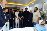 عیادت ملی‌پوشان فوتبال از جانباز سرافراز جنگ رمضان حسین محمدی 3