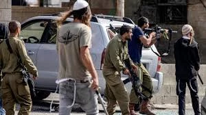 Settlers, sanctions
and impunity
